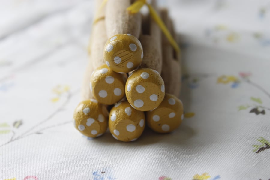 Spotty painted vintage dolly pegs - 6 - yellow with white spots