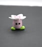 pink glass flower head figure - Image 1