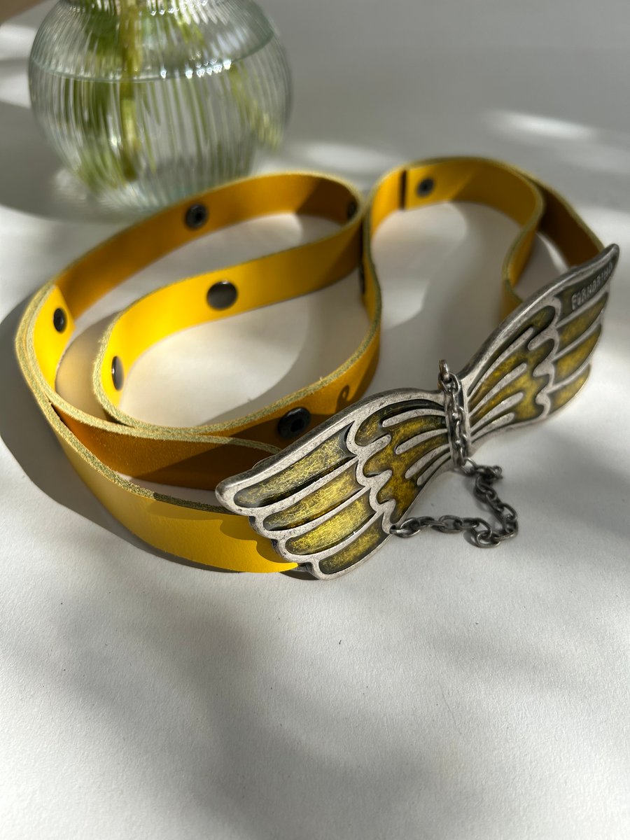 Statement yellow leather wings belt
