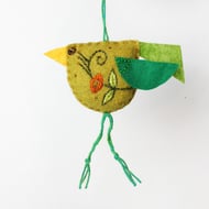Mustard coloured felt bird with hand embroidered body