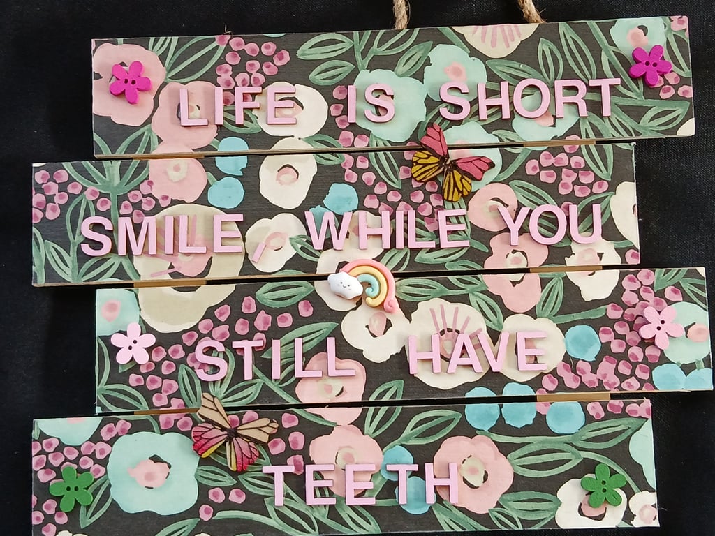 Hand decorated hanging wooden sign 