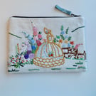Make up bag zipped in reclaimed cloth crinoline lady with Laura Ashley lining 