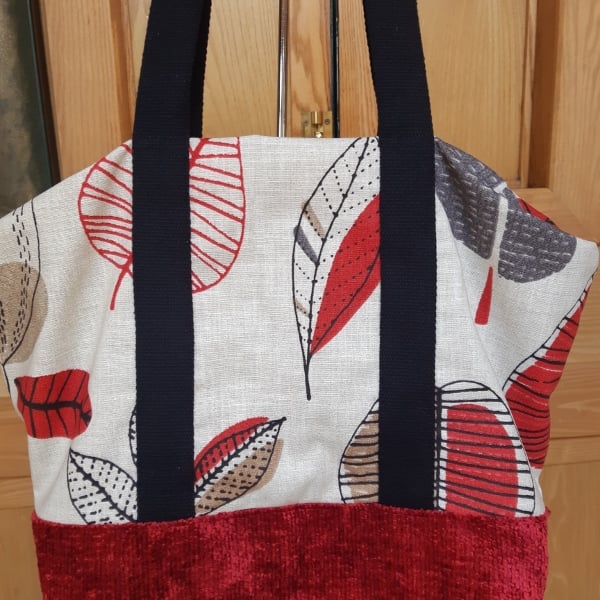 Red velour and vintage print bag