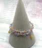 Memory wire bangle with peach moonstone, quartz, amethyst and selenite  - Image 4