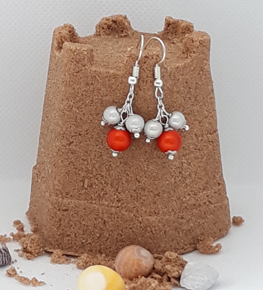 ER12 Silver and orange miracle bead drops