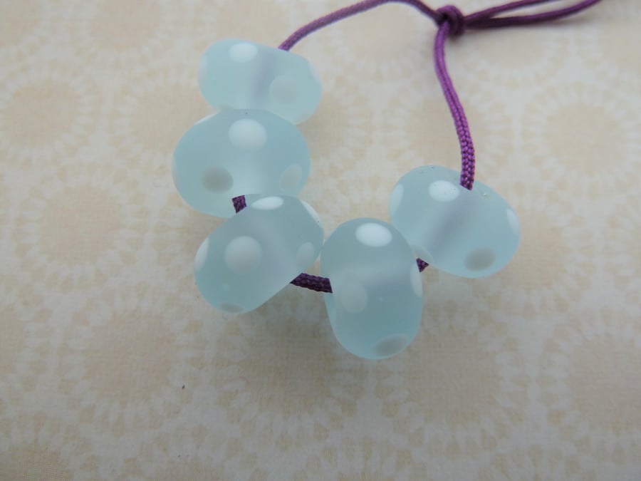 handmade blue and white frosted spot lampwork glass beads