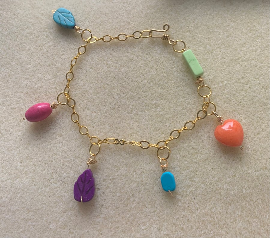 Beautiful gold agate bracelet.  Coloured agate charms.  Unique gift.  