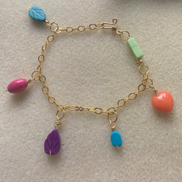 Beautiful gold agate bracelet.  Coloured agate charms.  Unique gift.  