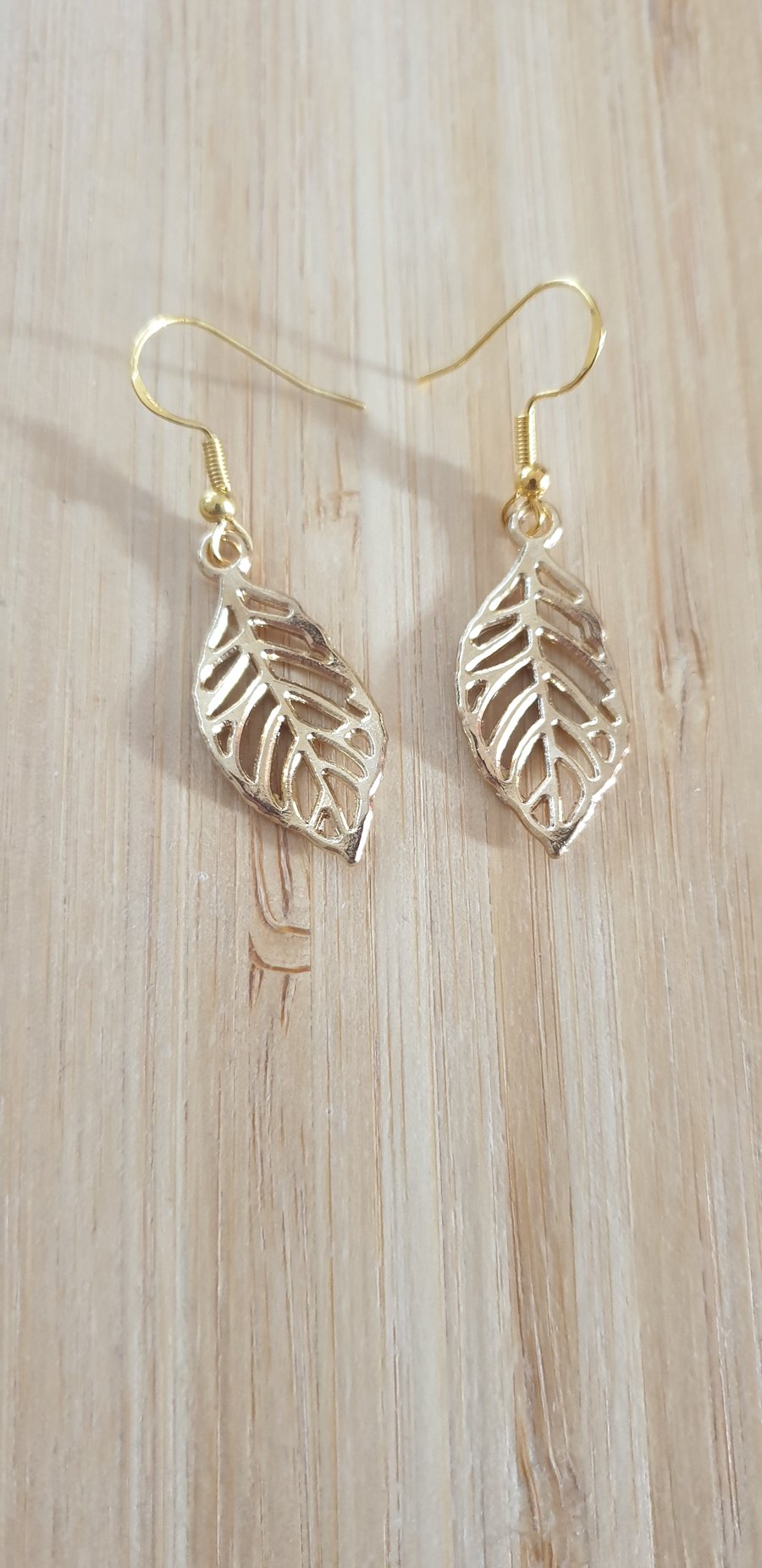 Gold filigree leaf earrings 