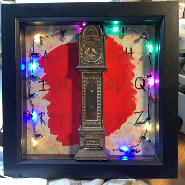 Stranger Things inspired picture. Lights up. Vecna’s clock. 