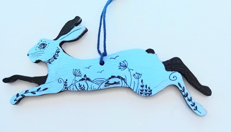 misty blue hare  looking lovely on wood hand painted 