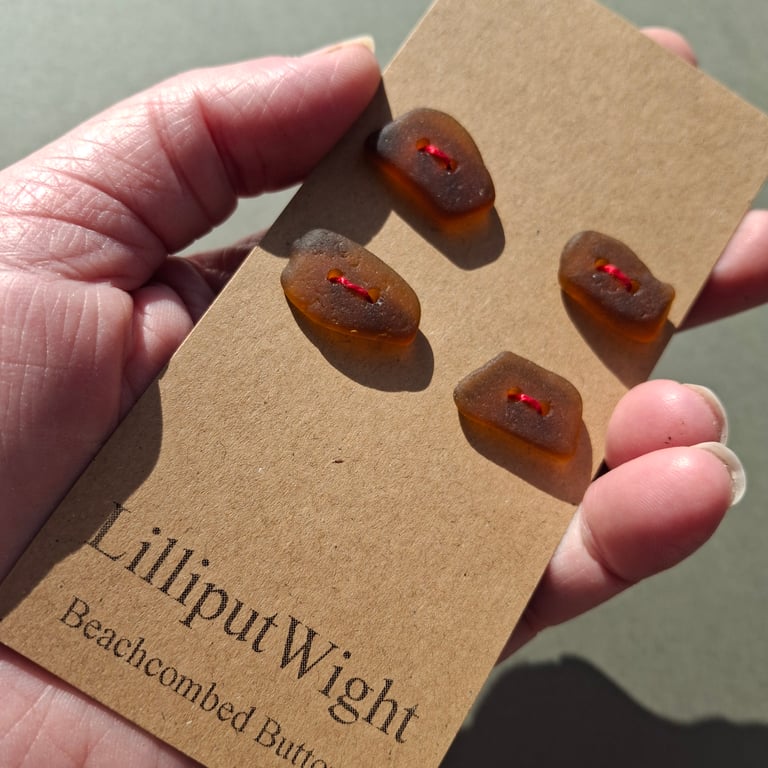 Set of four brown sea glass buttons