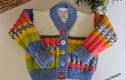 HAND KNITTED DESIGNER BABY CARDIGANS, JACKETS & GIFT SETS