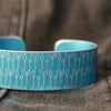 Spring buds pattern aluminium cuff bracelet blue