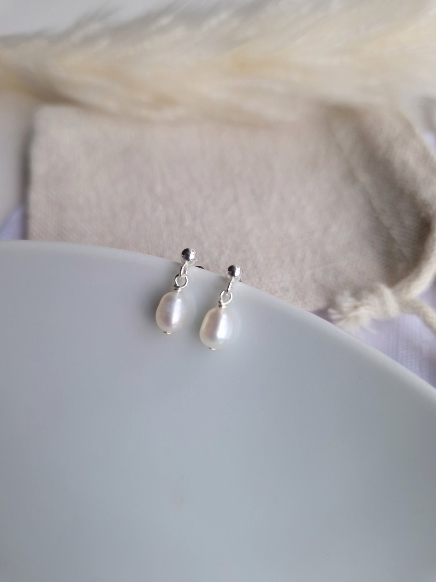 Dainty ivory freshwater pearl and sterling silver stud drop earrings
