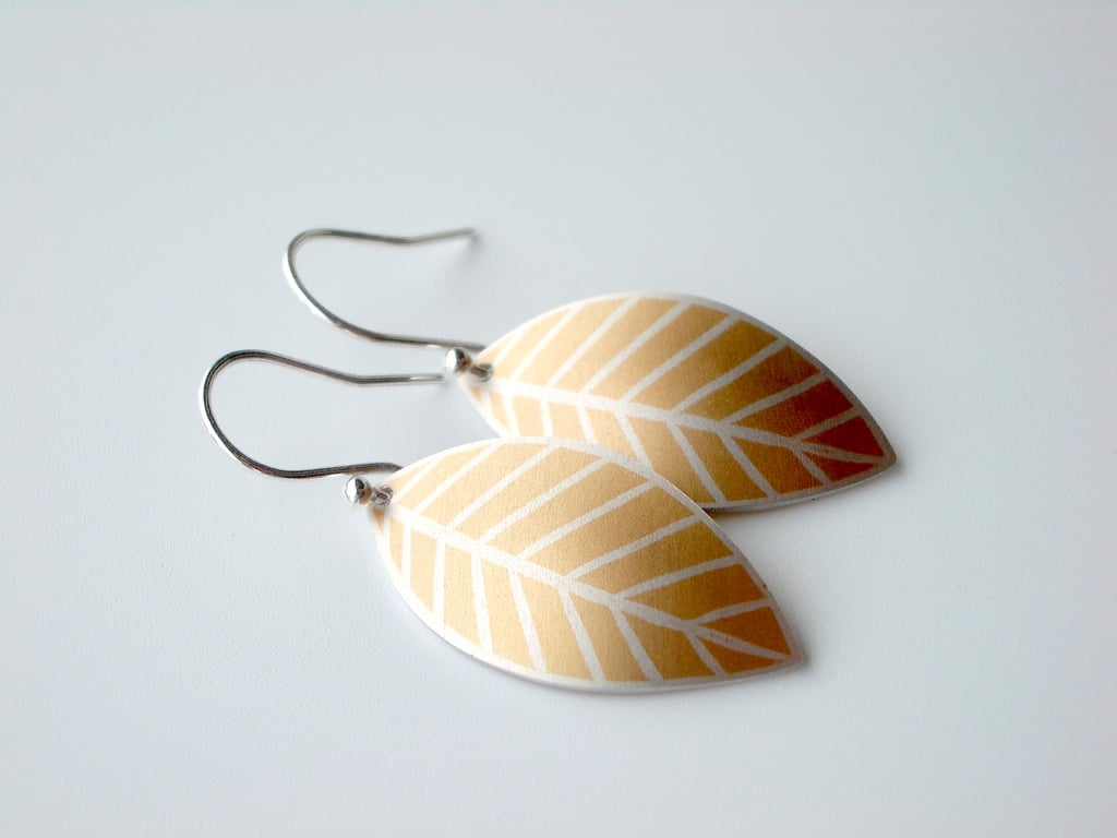 Orange leaf oval earrings