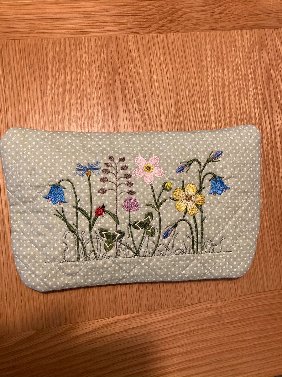 Floral quilted embroidered make up bag. 