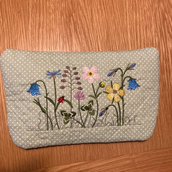 Floral quilted embroidered make up bag. 