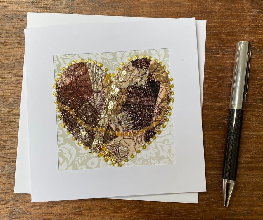 Up-cycled embroidered gold heart card. 