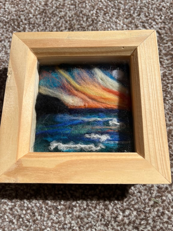 Sunset over cliffs and sea needle felt pine box frame 