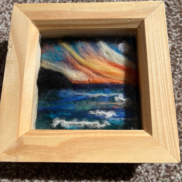 Sunset over cliffs and sea needle felt pine box frame 