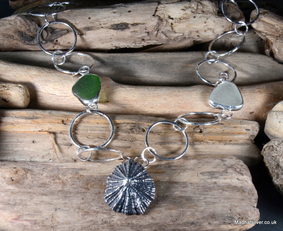Sterling silver sea shell and sea glass pendant