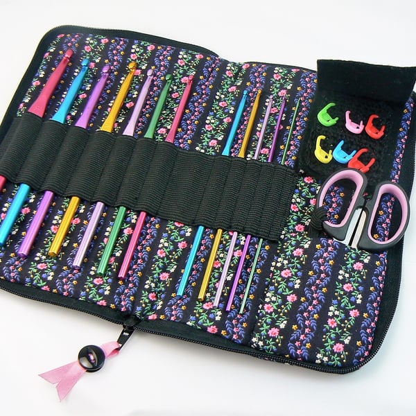 crochet hook case including  hooks, scissors and stitch markers