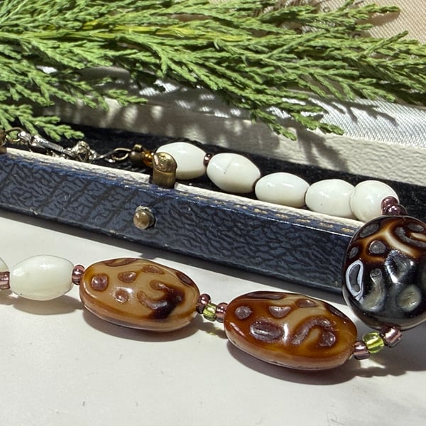 Glass vintage bead bracelet in cream and deep brown