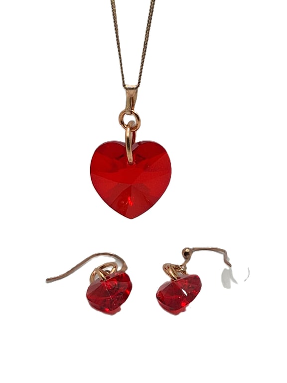 Necklace and earrings set with red heart shaped Swarovski crystals