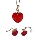 Necklace and earrings set with red heart shaped Swarovski crystals