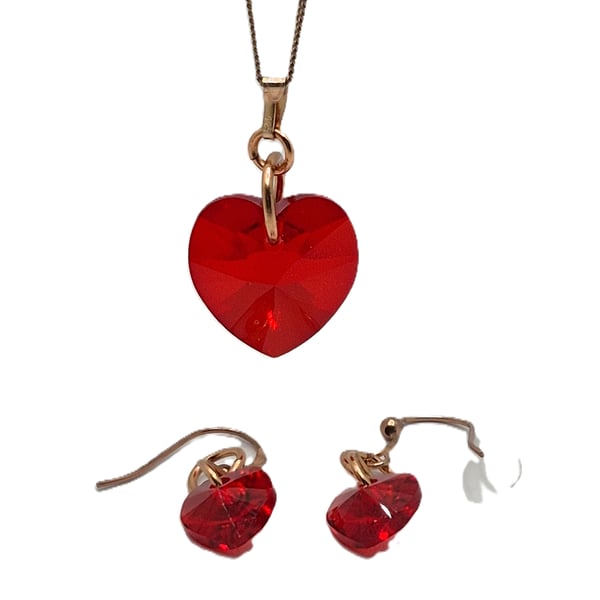 Necklace and earrings set with red heart shaped Swarovski crystals