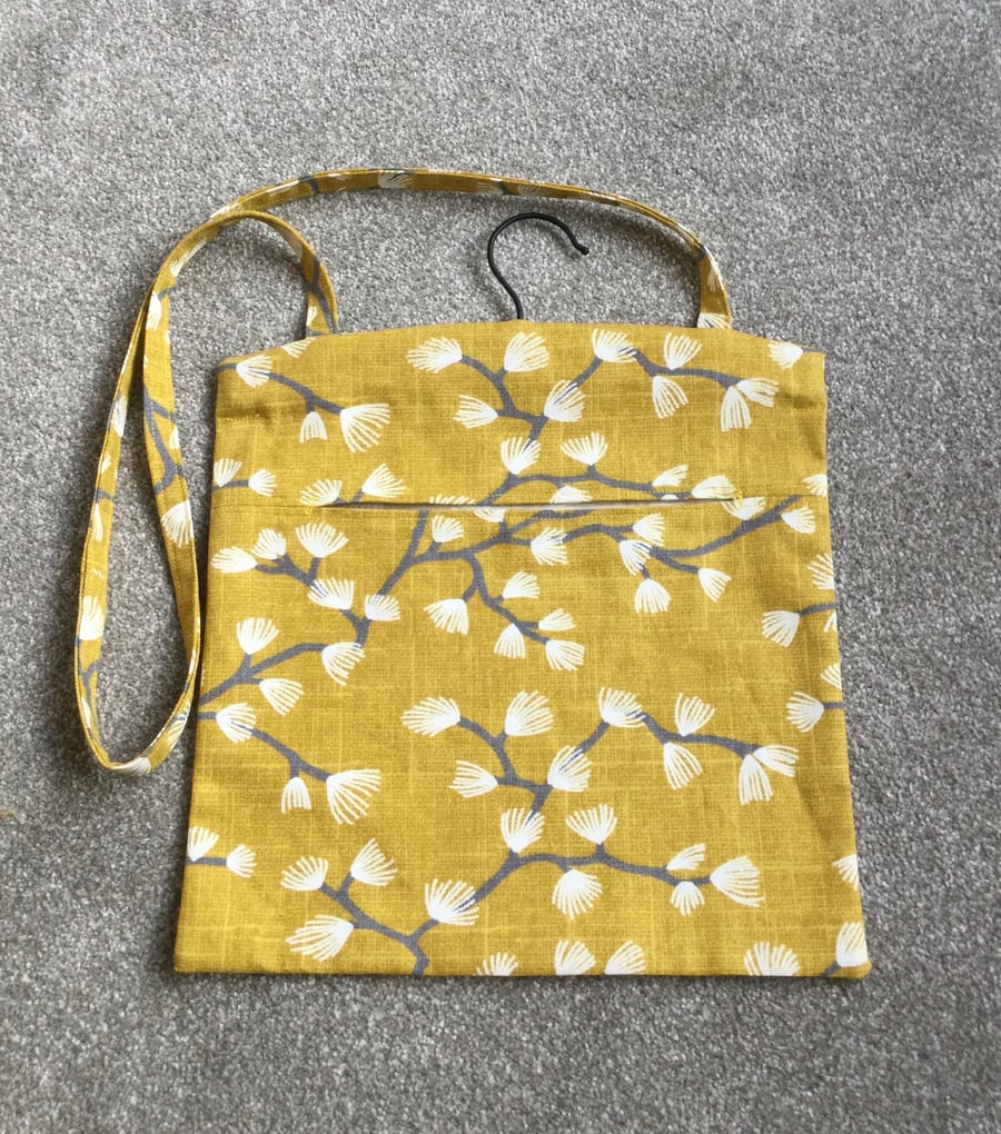 Peg Bag with hanger and over body strap.