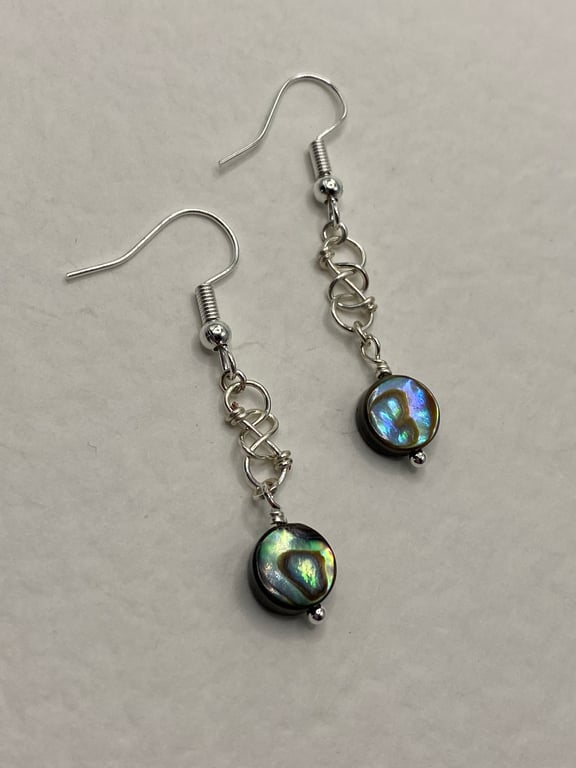 Wirework infinity symbol earrings with circular paua shell charms