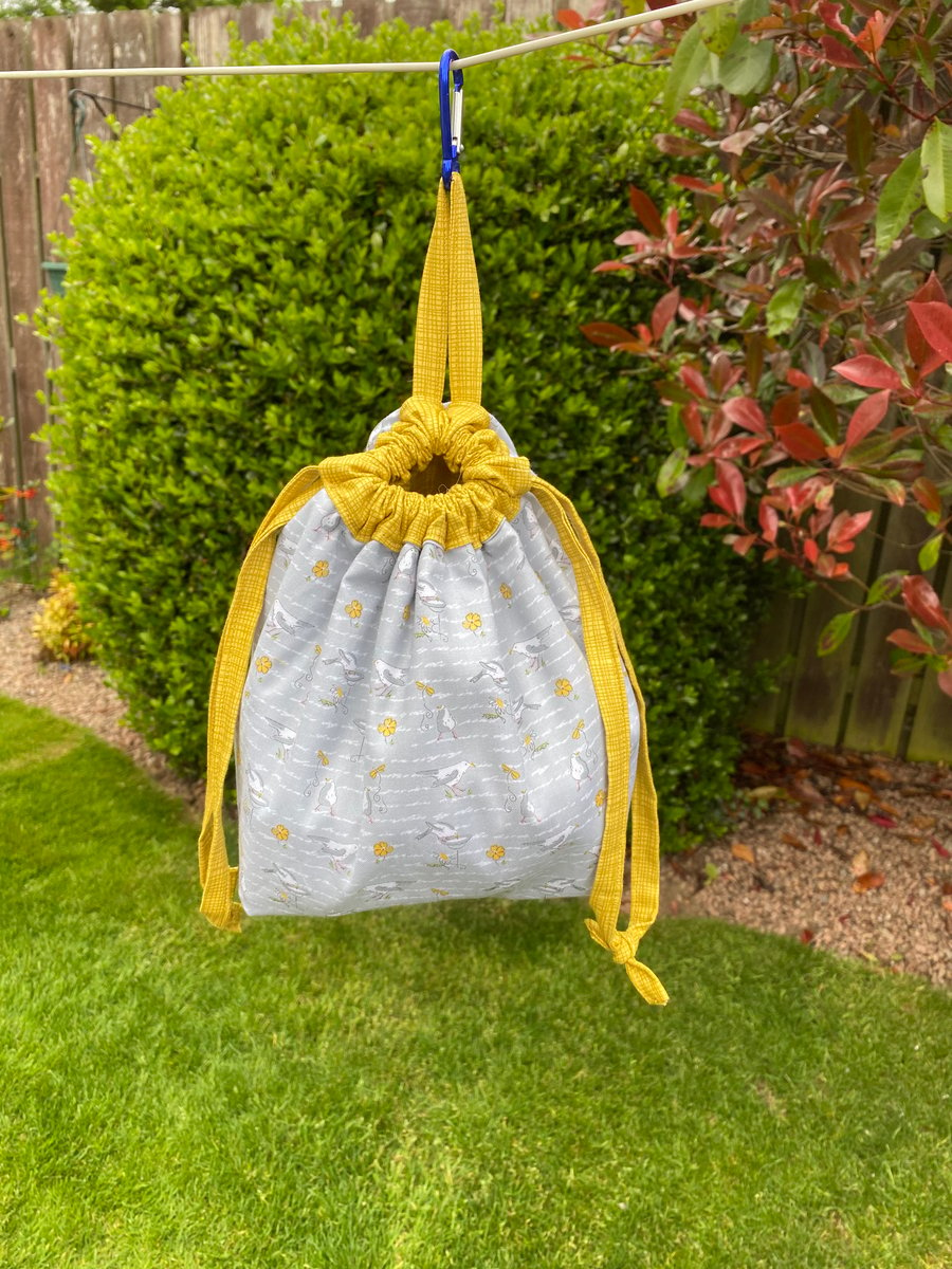 Grey and yellow birds and flowers Cotton Drawstring Peg Bag with hanging Tab