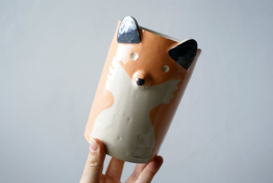 One ceramic vase with fox design - glazed in simply clay