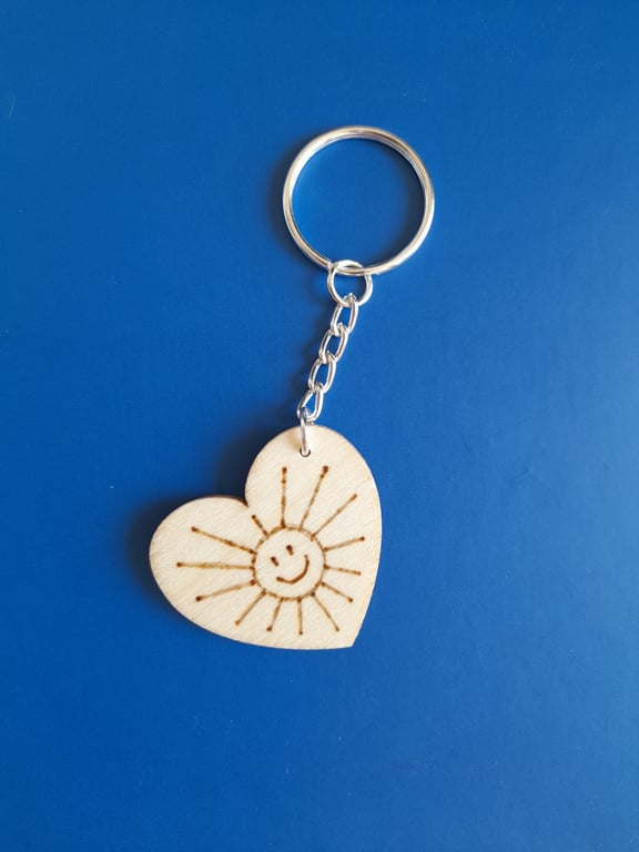 Smiling heart keychain. Small souvenir. Charming keyring. Emoji keychain.
