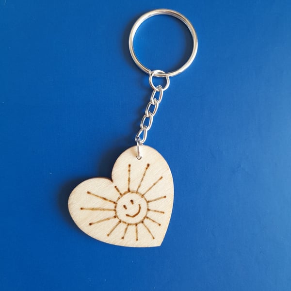 Smiling heart keychain. Small souvenir. Charming keyring. Emoji keychain.