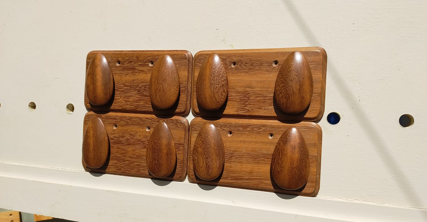 Four sapele door pebbles