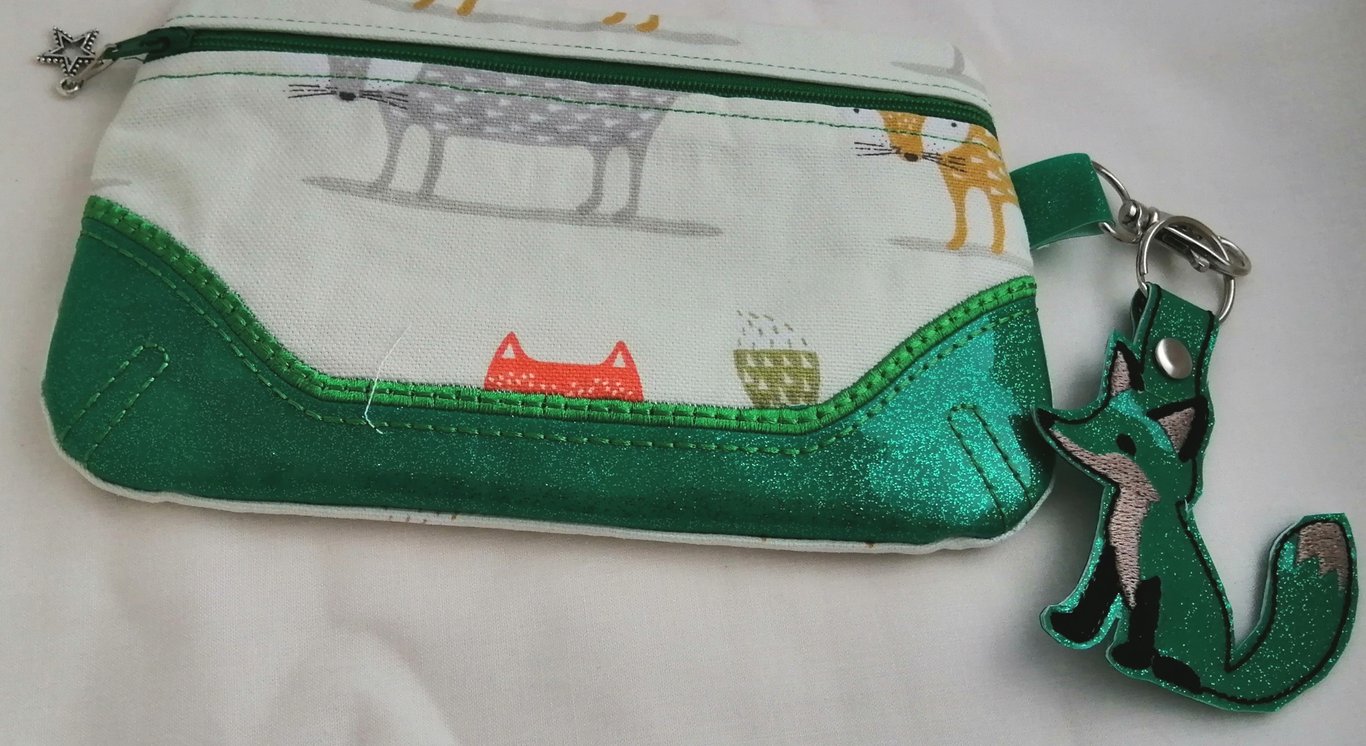 GREEN GLITTER VINYL AND FOXY BAG WITH FREE FOX KEYRING.