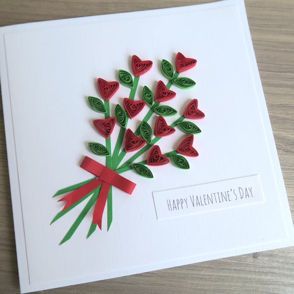 Handmade Valentine's day card with bouquet of quilled hearts