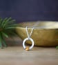 Citrine Gemstone and Dainty Silver Circle Pendant Necklace - Image 1