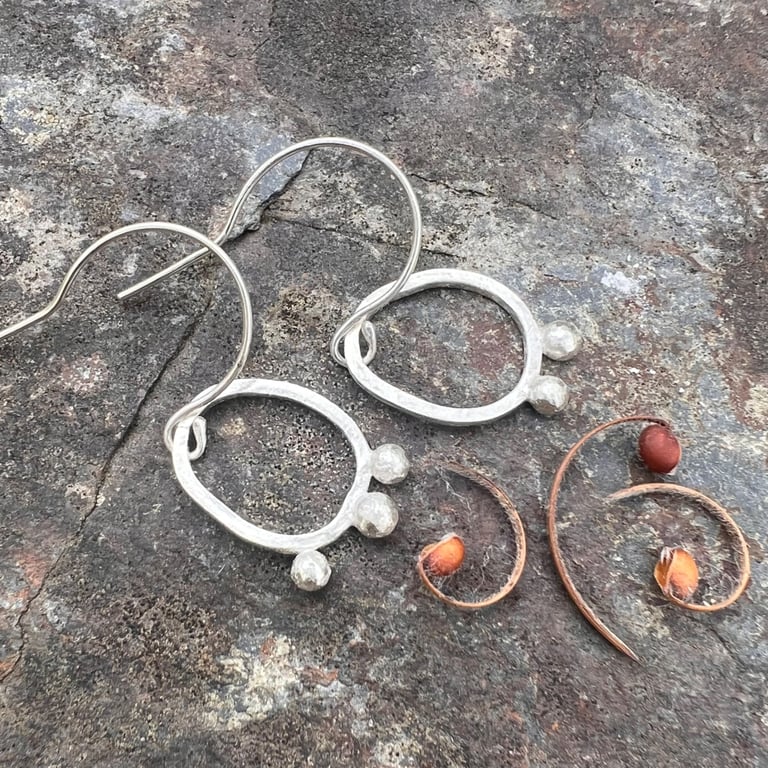  Silver Seed Pod Mismatched Dangle Earrings