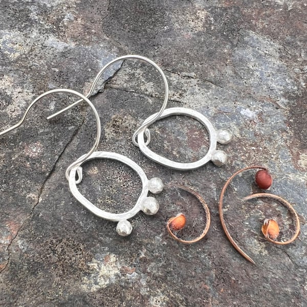  Silver Seed Pod Mismatched Dangle Earrings