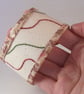Hand embroidered fabric cuff with simple embroidery - Image 1