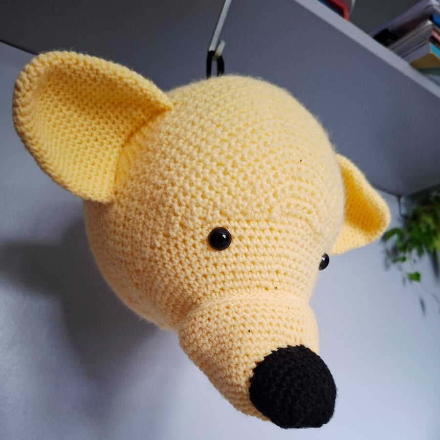 Yellow crocheted bear trophy head with hanging loop