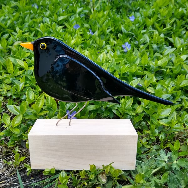 Fused glass blackbird on wooden stand