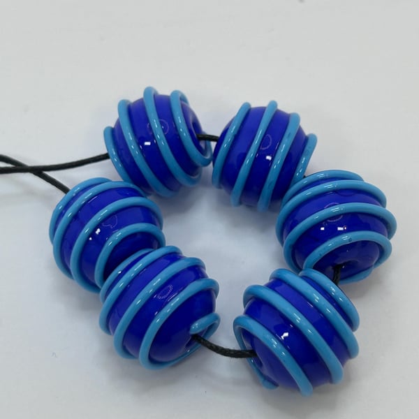 Handmade blue stripey lamp work glass beads