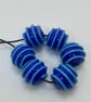 Handmade blue stripey lamp work glass beads - Image 1