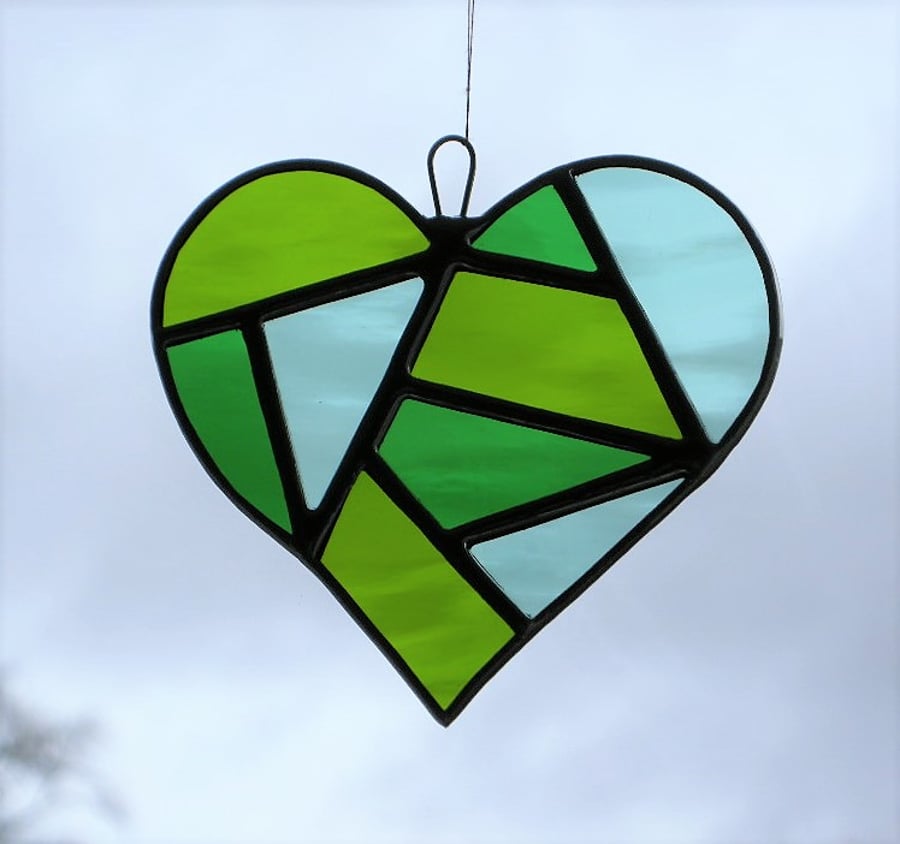 Stained glass suncatcher love heart in medium green,moss green and pale green