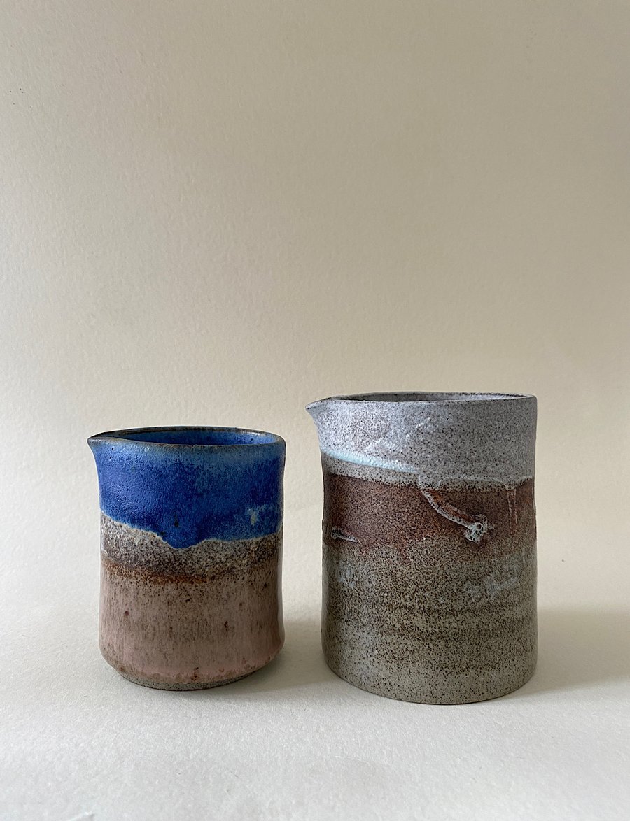 Rustic ceramic pourer set.